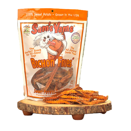 Packaging of Sandy's Yams Bichon Fries, which are sweet potato treats for dogs, with the product visible spilling out in front of the package.